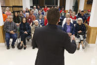 In this Tuesday, Oct. 15, 2019 photo, Virginia Del. Nick Freitas, front back to camera, gestures during a town hall in Lake of Woods, Va. Freitas is running a write in campaign after a paperwork error left his off the November ballot. (AP Photo/Steve Helber)