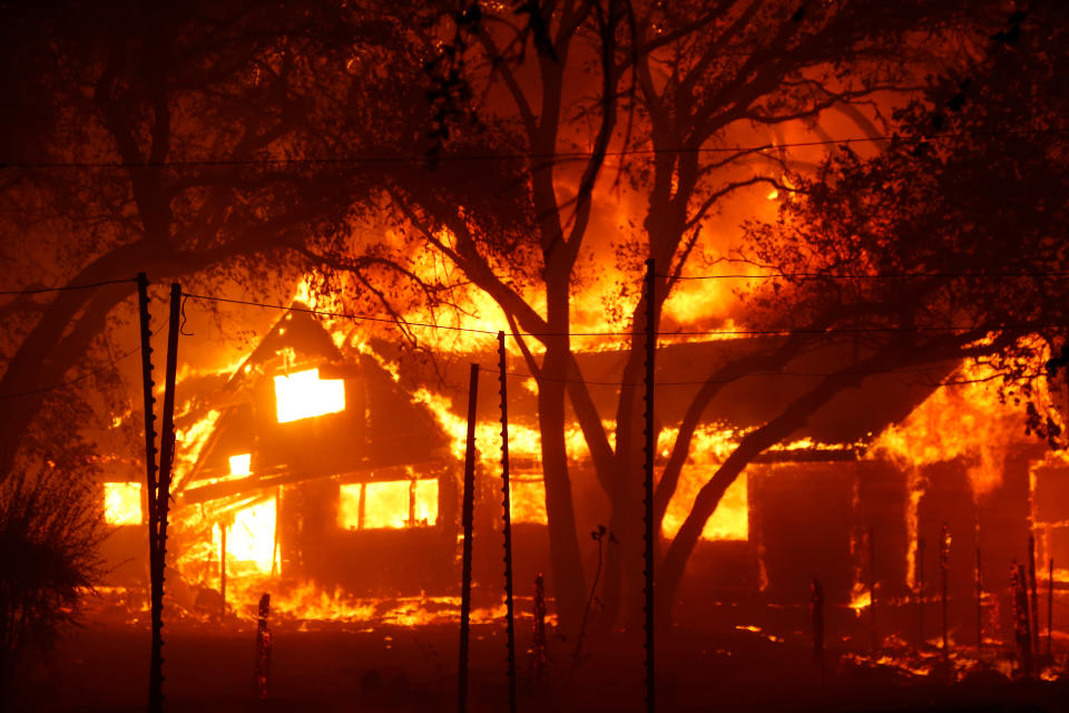 GEYSERVILLE, CA -  OCT. 27: A structure on Highway 128 goes up in flames after the Kincade Fire raged into the Alexander Valley, Sunday morning, Oct. 27, 2019, east of Geyserville, Calif. (Karl Mondon/MediaNews Group/The Mercury News via Getty Images)