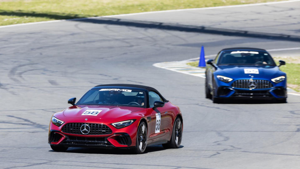 At the AMG Driving Academy, a pair of Mercedes-AMG SLs aim for the next apex.