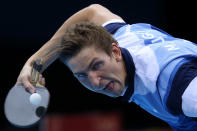 "I wish I put on some ChapStick before this game."<br> LONDON, ENGLAND - JULY 29: Matiss Burgis of Latvia plays a forehand in his Men's Singles second round match against Alexey Smirnov of Russia on Day 2 of the London 2012 Olympic Games at ExCeL on July 29, 2012 in London, England. (Photo by Feng Li/Getty Images)