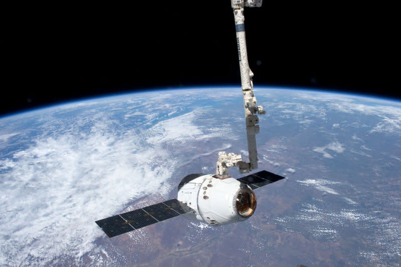 The SpaceX Dragon capsule is grappled by the Canadarm2 robotic arm at the International Space Station on May 25, 2012. File Photo courtesy of NASA