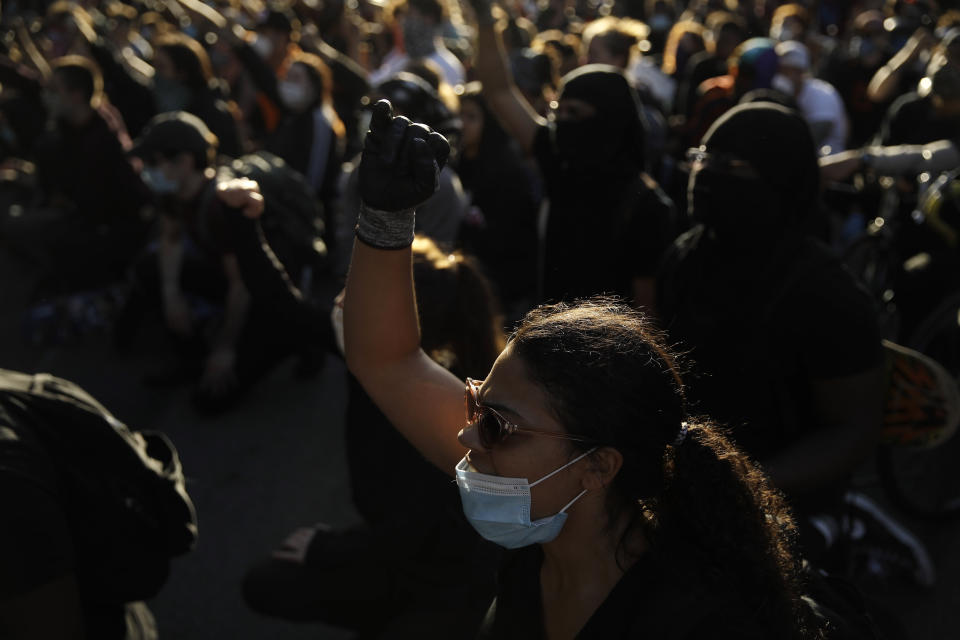 Protesters gather in Philadelphia, Monday, June 1, 2020 during a march calling for justice over the death of George Floyd in Philadelphia, Monday, June 1, 2020. Floyd died after being restrained by Minneapolis police officers on May 25. (AP Photo/Matt Rourke)