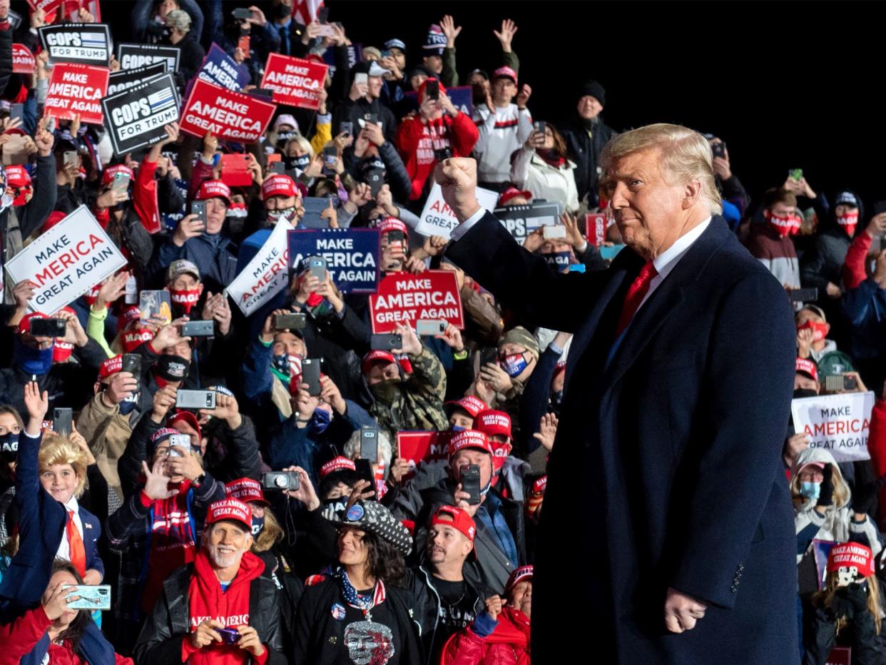 Trump's base is deserting him according to the latest polls (AFP via Getty Images)