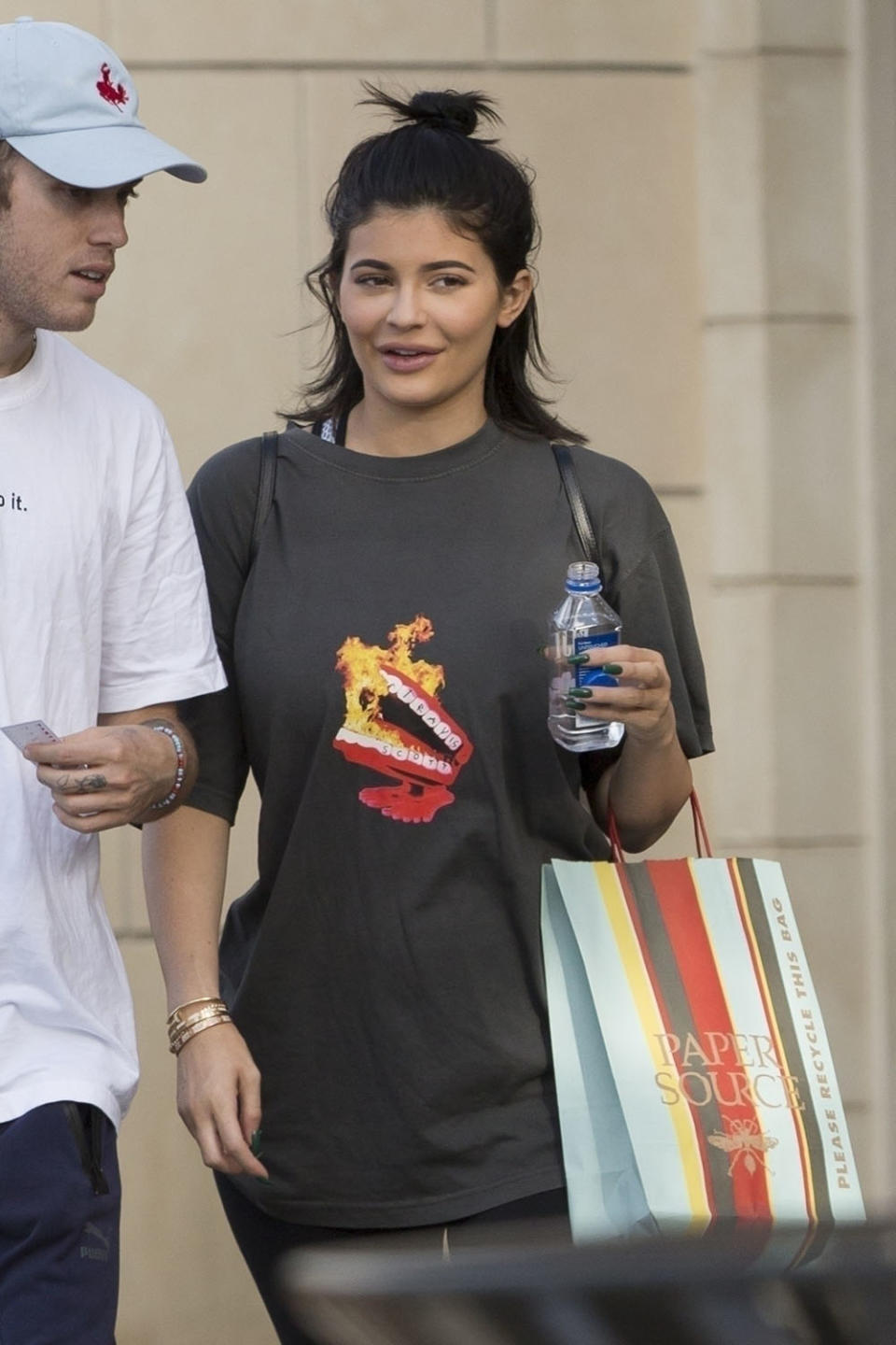 <p>According to TMZ, the 20-year-old Kylie and 25-year-old Travis Scott began telling friends earlier this month. Jenner pictured here with her BFF Harry Hudson on 09/12/2017. (Photo: IXOLA / BACKGRID) </p>