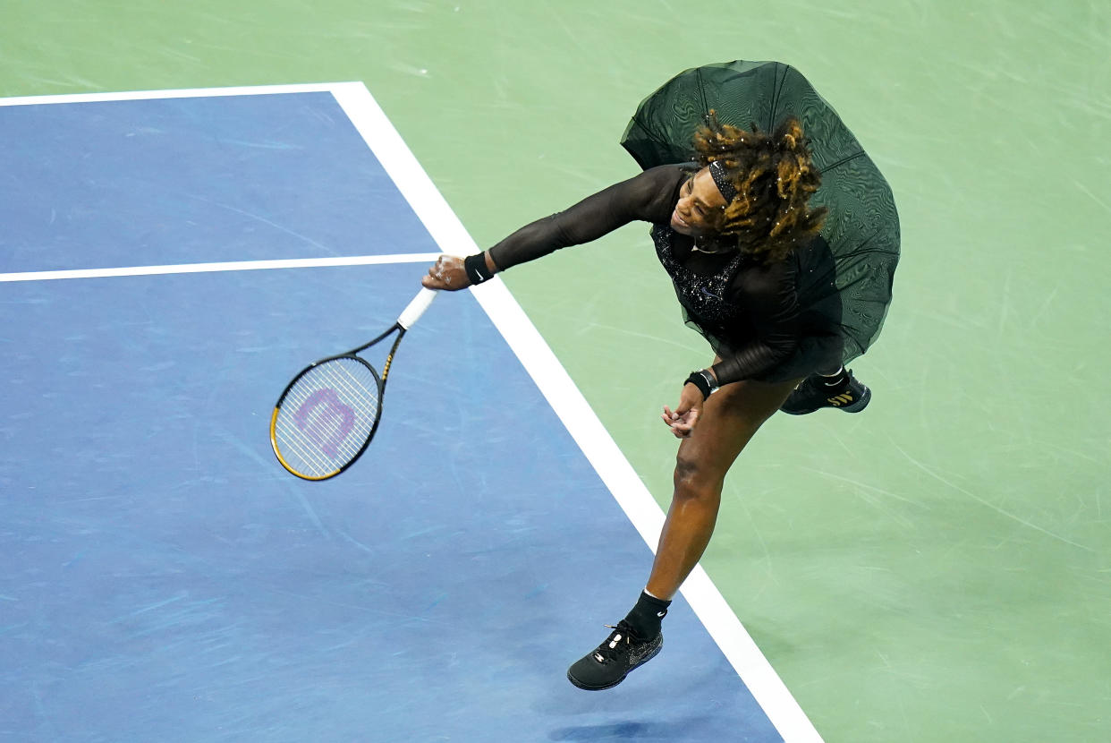 Serena Williams, of the United States, serves to Ajla Tomljanovic, of Austrailia, during the third round of the U.S. Open tennis championships, Friday, Sept. 2, 2022, in New York. (AP Photo/Frank Franklin II)