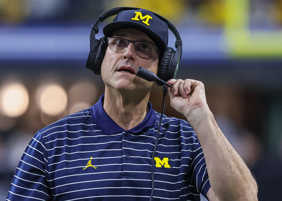 Michigan head coach Jim Harbaugh is likely facing a four-game suspension this season simply because he refused to admit to alleged minor violations. (Photo by Michael Hickey/Getty Images)