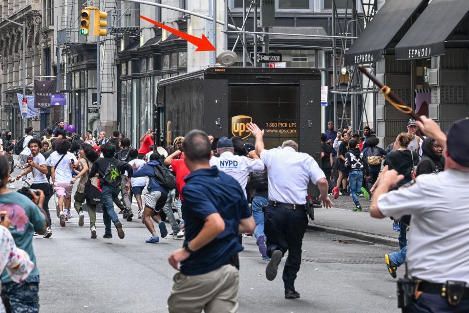 Fans attend Kai Cenat's giveaway in New York City's Union Square Park on August 4, 2023.