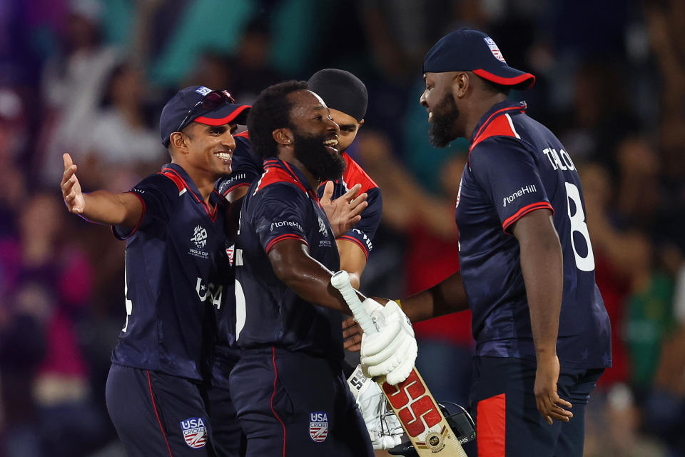 Members of Team USA celebrate winning their World Cup opener against Canada. (Robert Cianflone/Getty Images)