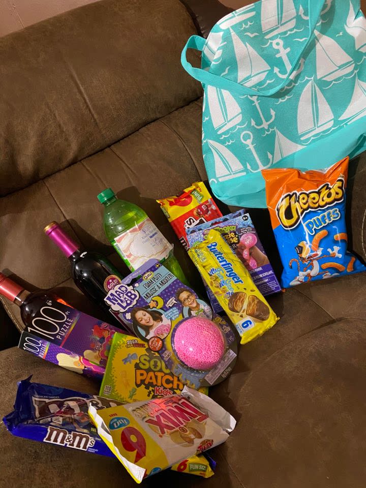 A Wine Fairies haul from Mississippi included chips, candy, wine, a puzzle and a bath bomb. (Photo: Calli Collins)