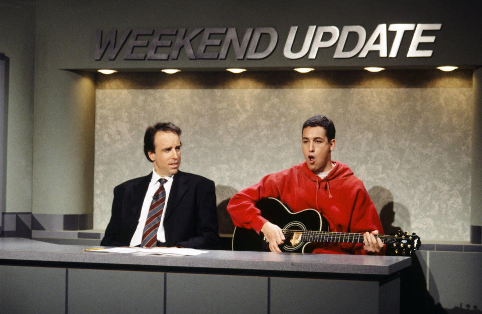 Adam Sandler and Kevin Nealon during SNL's 'Weekend Update' skit on February 13, 1983. / Credit: Al Levine/NBCU Photo Bank/NBCUniversal via Getty Images