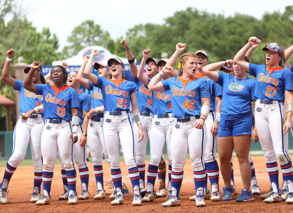 The University of Florida softball team cheers to the fans after the Gators beat Wisconsin in the championship game of the Gainesville Regionals in the NCAA Softball Championships, at Katie Seashole Pressly Stadium in Gainesville Fla. May 22, 2022. After a 10-run first inning, the Gators sailed to a 11-0 victory over the Badgers.