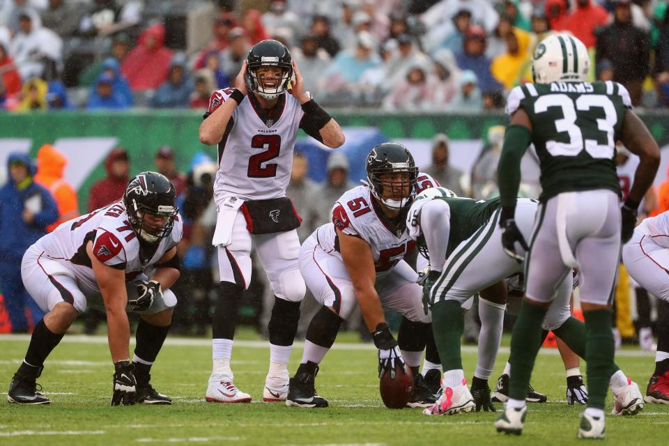 <p>Quarterback Matt Ryan of the Atlanta Falcons at the line of scrimmage against the New York Jets during the first half of the game at MetLife Stadium. (Photo by Al Bello/Getty Images)</p>