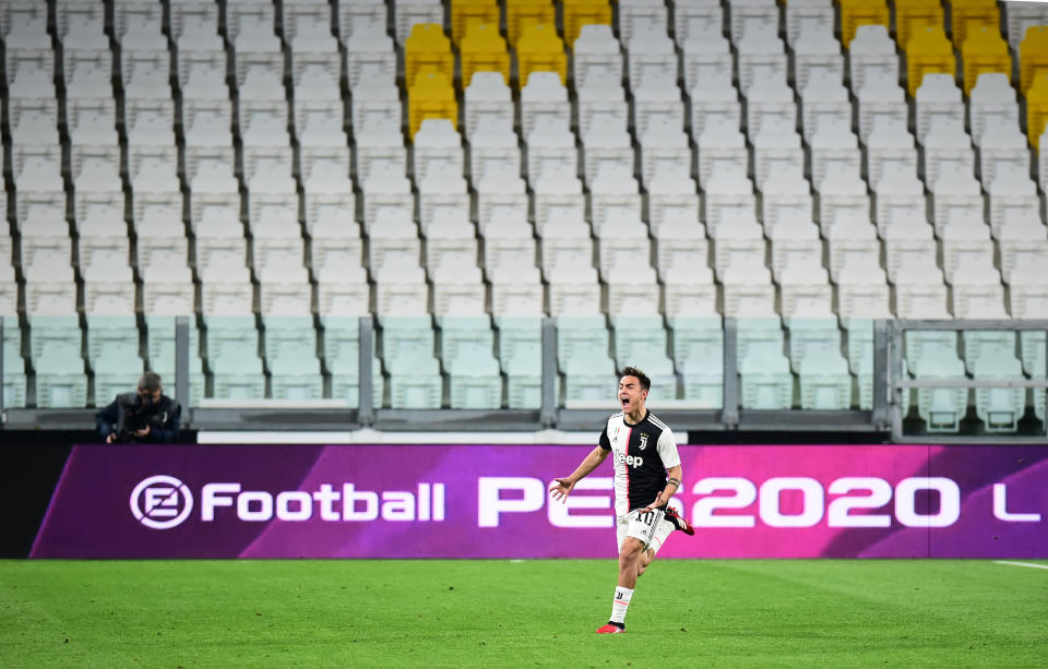 Paulo Dybala celebrates his goal in front of an empty stadium during Juventus' win over Inter Milan. (REUTERS/Massimo Pinca)