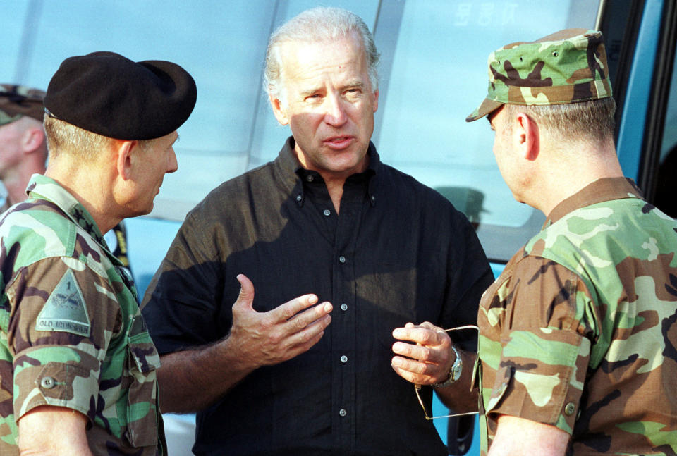 Biden talks with Lt. Gen. Daniel Zanini, commander of 8th Army chief of staff of UNC &amp; USFK, left, and Lt. Gen. William Miller, UNC security battalion commander, on Aug. 11, 2001, at the border village of Panmunjom, South Korea.