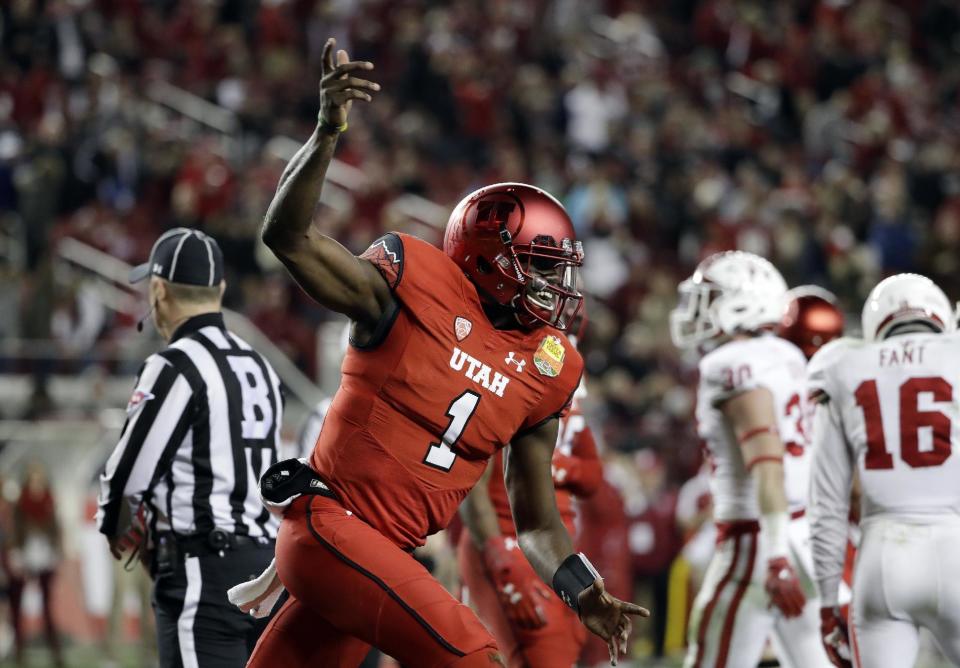 Utah quarterback Tyler Huntley (1) was named the team’s starter on Monday. (AP)