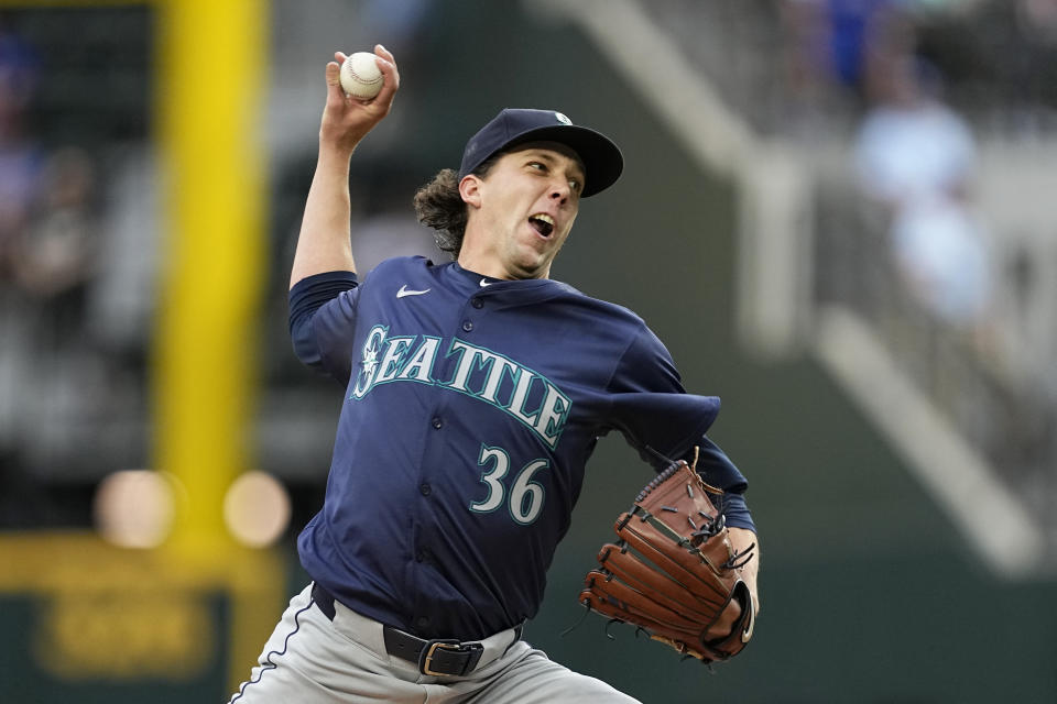 Seattle Mariners starting pitcher Logan Gilbert throws to the Texas Rangers in the first inning of a baseball game in Arlington, Texas, Tuesday, April 23, 2024. (AP Photo/Tony Gutierrez)