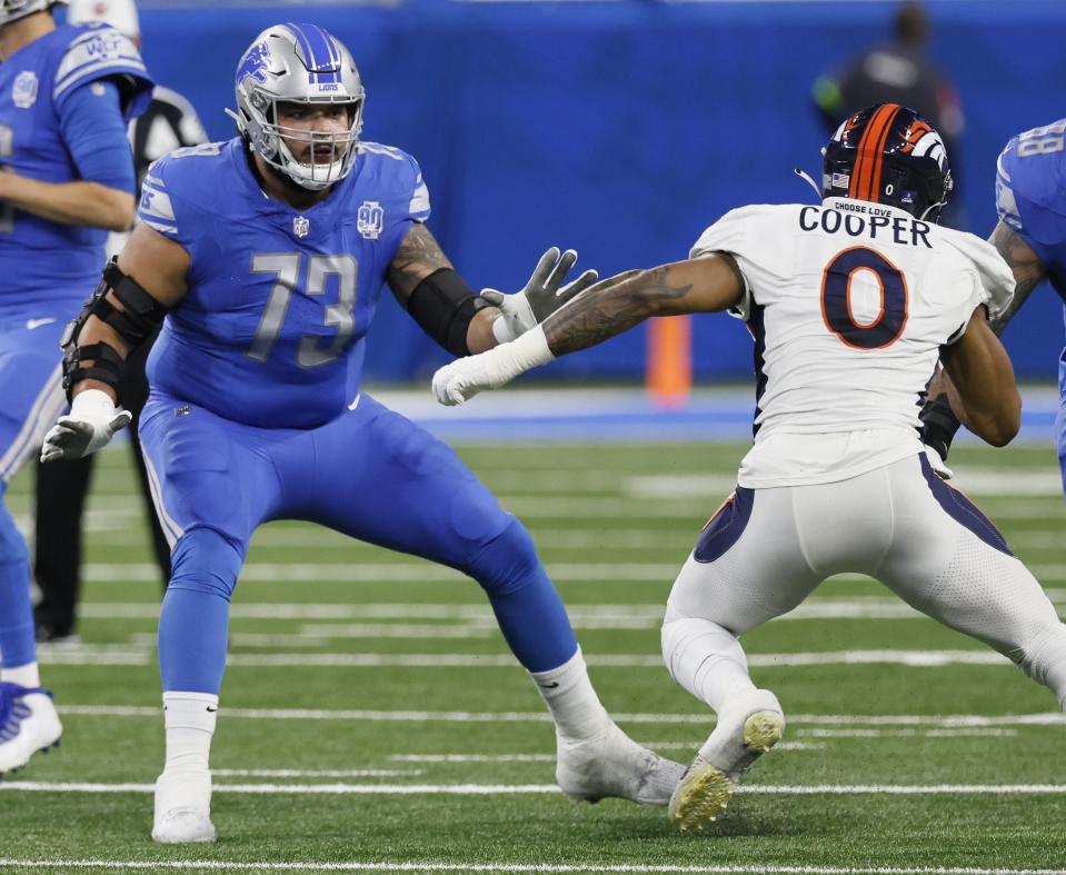 FILE - Detroit Lions guard Jonah Jackson (73) blocks against Denver Broncos linebacker Jonathon Cooper (0) during the first half of an NFL football game against the Denver Broncos Saturday, Dec. 16, 2023, in Detroit. The Los Angeles Rams have agreed to contract terms with tight end Colby Parkinson and guard Jonah Jackson, a person with knowledge of the deals said Monday, March 11, 2024. Jackson will sign a three-year contract potentially worth $51 million with $34 million guaranteed. (AP Photo/Duane Burleson, File)