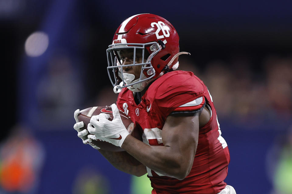 ATLANTA, GEORGIA - DECEMBER 2: Jam Miller #26 of the Alabama Crimson Tide makes a reception and turns upfield to rush in for a touchdown during the second quarter of the SEC Championship against the Georgia Bulldogs at Mercedes-Benz Stadium on December 2, 2023 in Atlanta, Georgia. (Photo by Todd Kirkland/Getty Images)