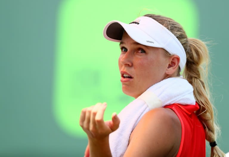 Caroline Wozniacki of Denmark looks on between games against Johanna Konta of Great Britain during the Women's Final on Day 13 of the Miami Open at Crandon Park Tennis Center on April 1, 2017 in Key Biscayne, Florida