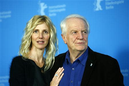 Cast members Sandrine Kiberlain (L) and Andre Dussollier pose during a photocall to promote the movie "Aimer, Boire Et Chanter" (Life of Riley) at the 64th Berlinale International Film Festival in Berlin February 10, 2014. REUTERS/Thomas Peter