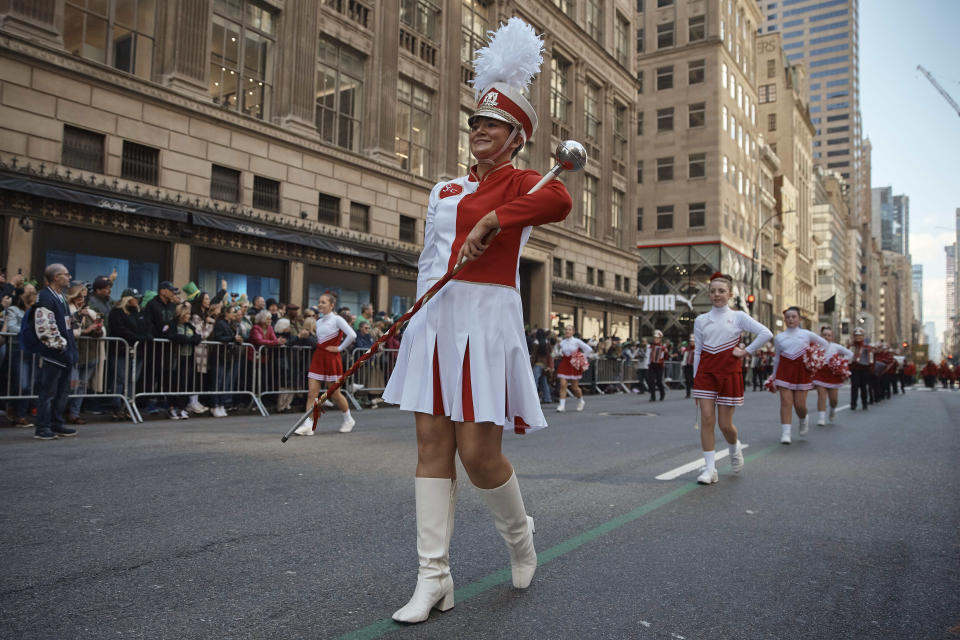 Cheerleaders march along Fifth Avenue during the St. Patrick's Day Parade on Saturday, March 16, 2024, in New York. (AP Photo/Andres Kudacki)