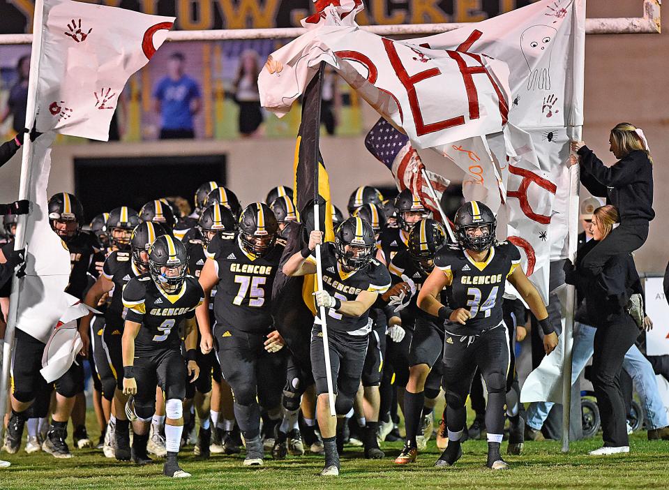 Glencoe football players enter the field for their game against Plainview in Glencoe, Alabama October 30, 2020.