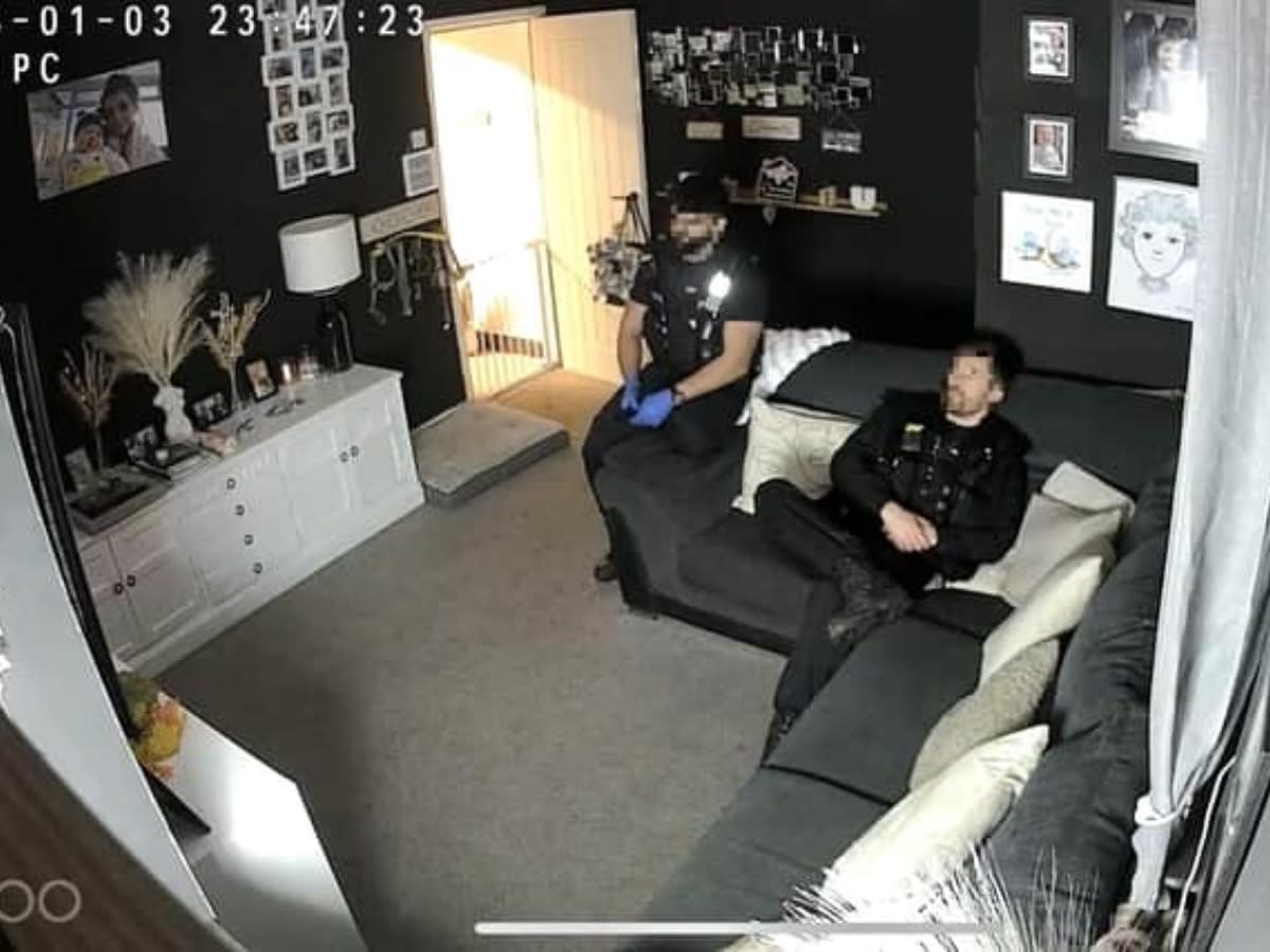 CCTV grab of the police in Abbygail Lawton's home. (Abbygail Lawton / SWNS)