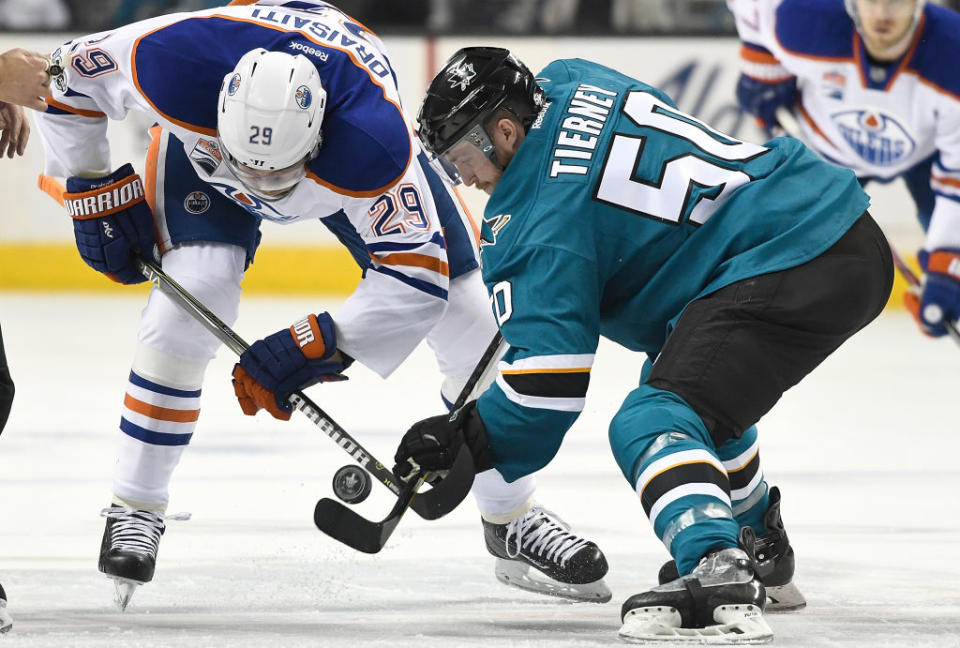 SAN JOSE, CA – APRIL 18: Leon Draisaitl #29 of the Edmonton Oilers battles for a faceoff with Chris Tierney #50 of the San Jose Sharks during the first period in Game Four of the Western Conference First Round during the 2017 NHL Stanley Cup Playoffs at SAP Center on April 18, 2017 in San Jose, California. (Photo by Thearon W. Henderson/Getty Images)