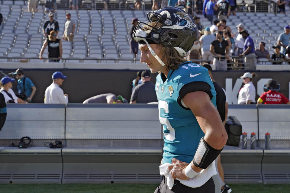 Jacksonville Jaguars quarterback Trevor Lawrence (16) leaves the field after the team lost to the New York Giants during an NFL football game Sunday, Oct. 23, 2022, in Jacksonville, Fla. (AP Photo/John Raoux)
