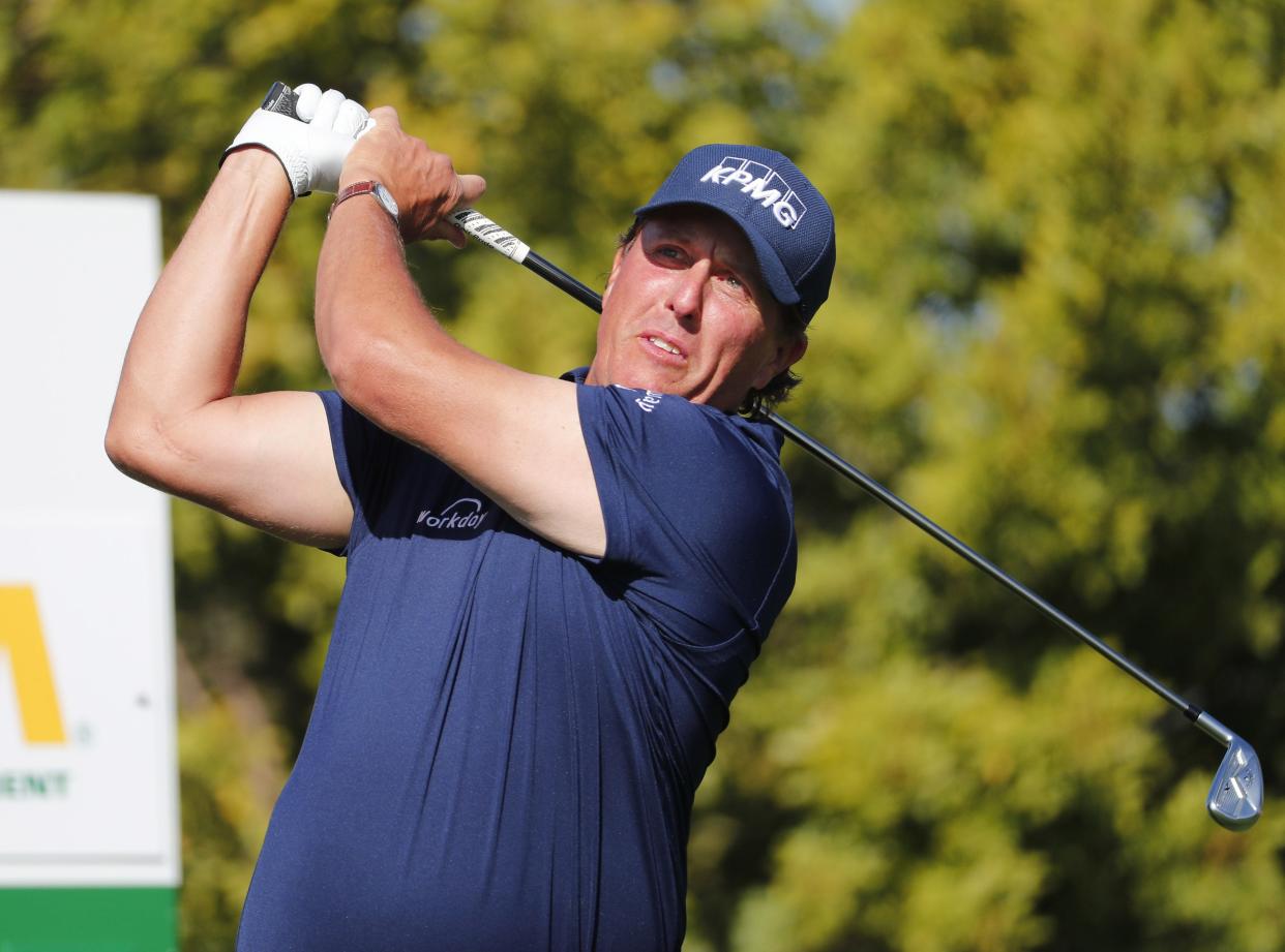 Phil Mickelson hits his tee shot on the second hole during the final round of the Waste Management Phoenix Open in 2019.