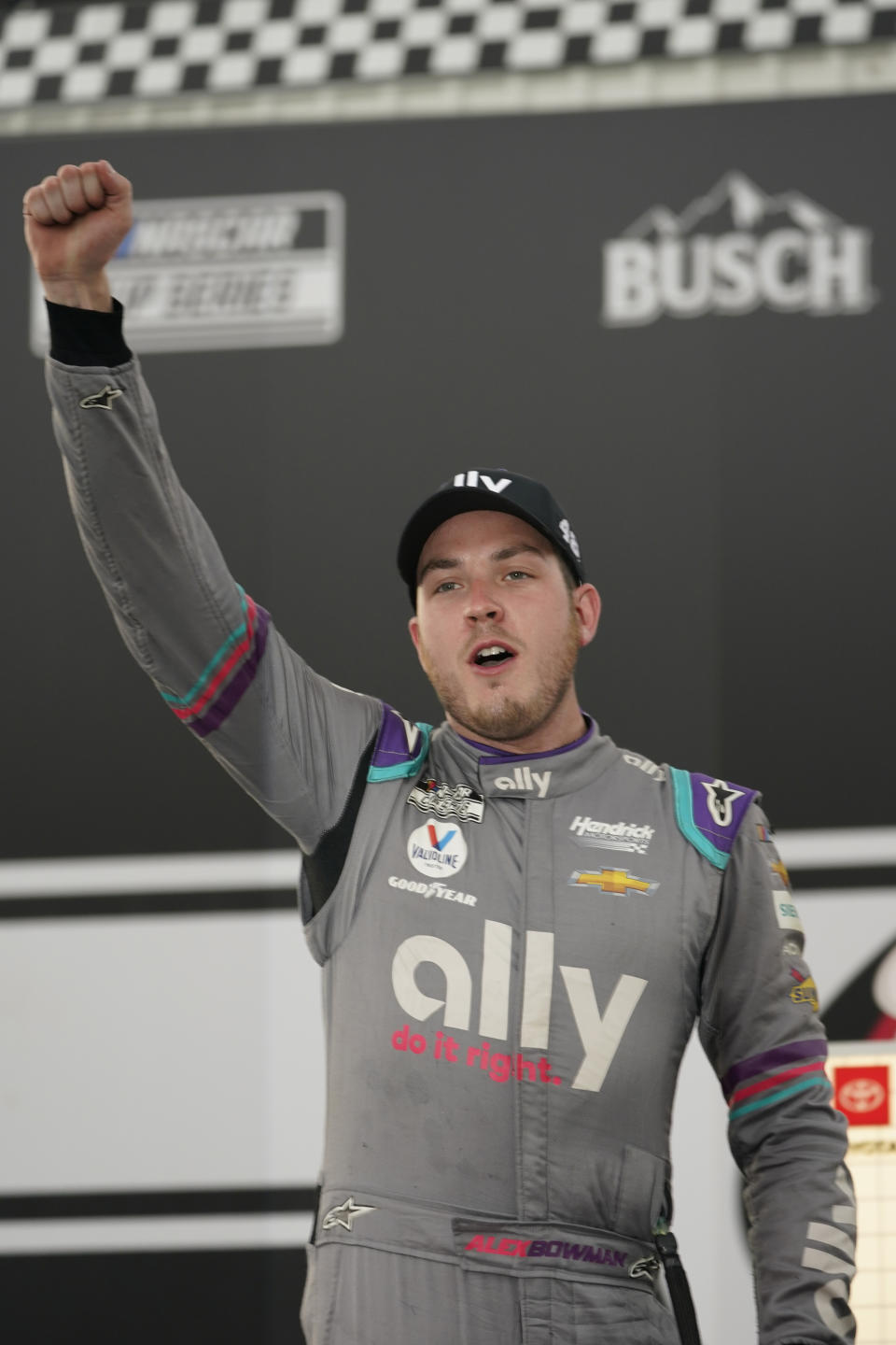 Alex Bowman (48) celebrates winning the NASCAR Cup Series auto race in victory lane at Richmond International Raceway in Richmond, Va., Sunday, April 18, 2021. (AP Photo/Steve Helber)