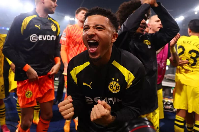 Jadon Sancho celebrates after Borussia Dortmund reached the Champions League final.