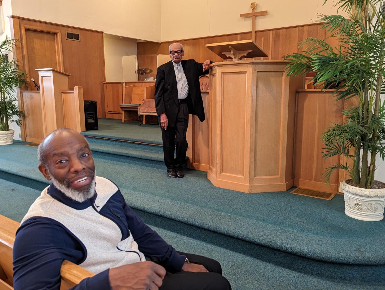 The Rev. Curtis Wilder (left) is set to succeed his father, the Rev. Willie Wilder (standing) as senior pastor of True Vine Revival Center in Canton on March 17.