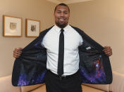 <p>Bradley Chubb shows off his style as he heads to the draft on Thursday, April 26, 2018, in Dallas. Bradley fully customized his COLLECTION by Michael Strahan suit, featuring a space-themed liner that represents his personal motto, “lift off.” (Rex Curry/AP Images for JCPenney) </p>