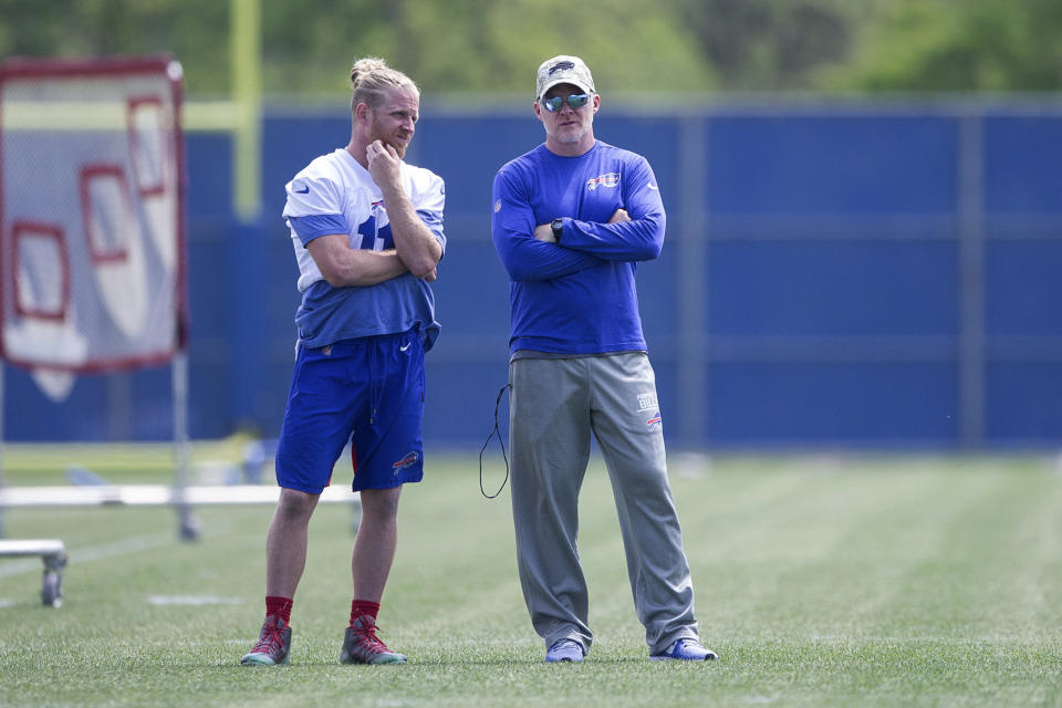 Buffalo Bills head coach Sean McDermott speaks with Buffalo Bills wide receiver Cole Beasley (11) during NFL football practice Tuesday, May 25, 2021, in Buffalo, N.Y. (AP Photo/Joshua Bessex)