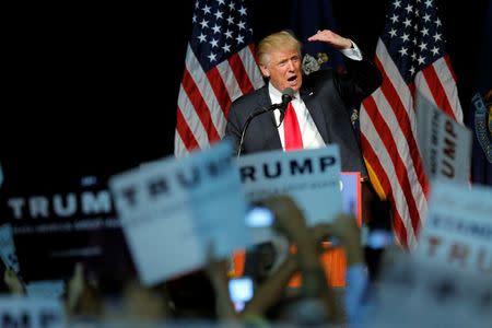 U.S. Republican presidential candidate Donald Trump takes the stage at a campaign rally in Bangor, Maine, June 29, 2016. REUTERS/Brian Snyder