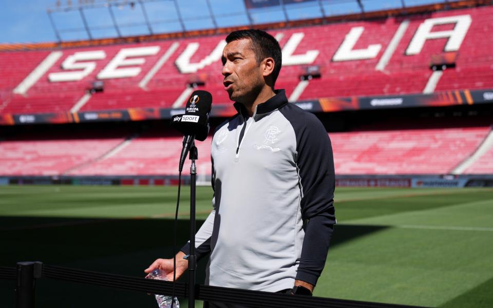 Giovanni van Bronckhorst, Head Coach of Rangers speaks to the media prior to the Rangers FC - Getty Images