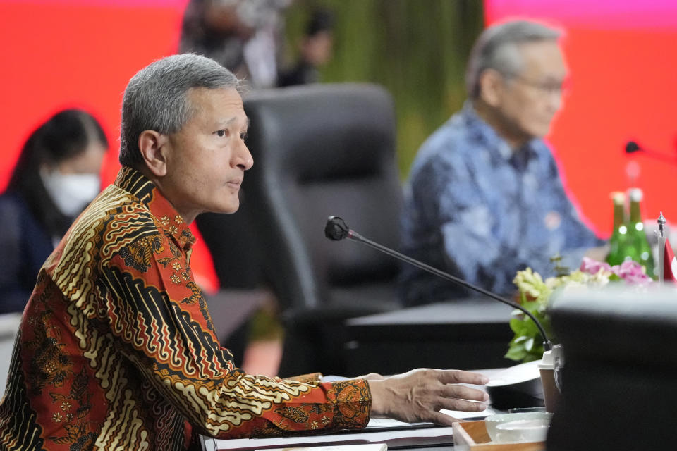 Singaporean Foreign Minister Vivian Balakrishnan sit during the Association of Southeast Asian Nations (ASEAN) foreign ministers retreat in Jakarta, Indonesia, Saturday, Feb. 4, 2023. (AP Photo/Achmad Ibrahim)