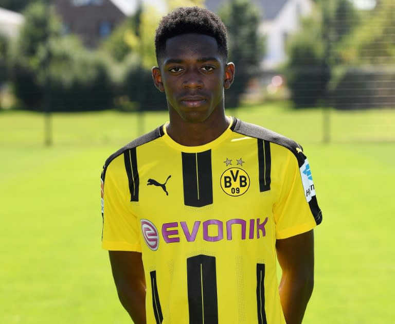 Borussia Dortmund's new signing, French midfielder Ousmane Dembele, poses for a photo during the team presentation, on August 17, 2016