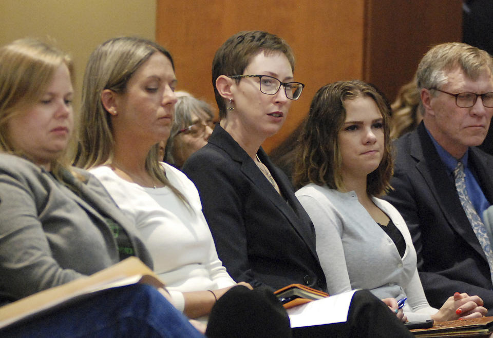 FILE - This Monday, April 15, 2019, file photo shows New Mexico Energy, Minerals and Natural Resources Secretary Sarah Cottrell Propst, center, attending a congressional field hearing about the affects of methane pollution on sacred Native American historical sites in Santa Fe, N.M. (AP Photo/Morgan Lee, File)