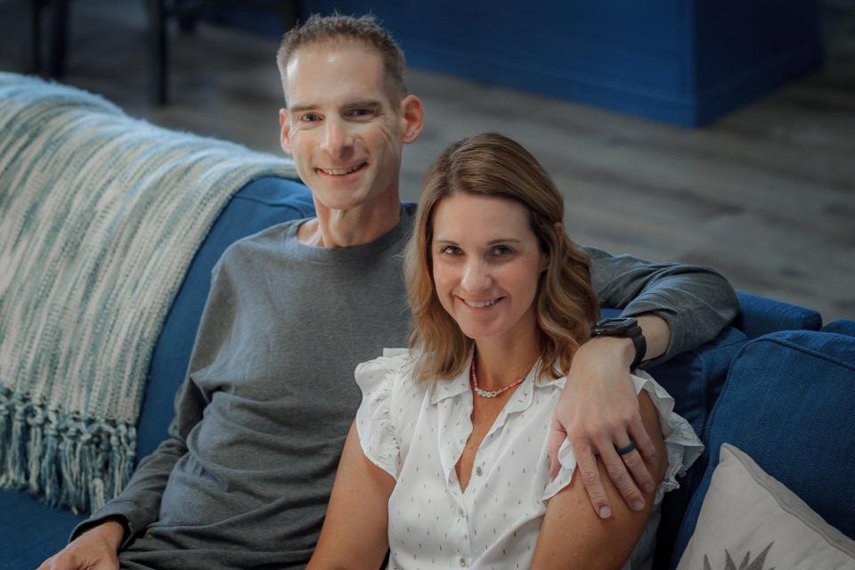 Brian and Julie Wolnewitz in a portrait at their home in Jupiter on August 18, 2021.