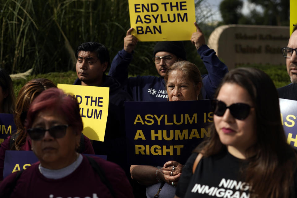 Demonstrators gather outside of the Richard H. Chambers U.S. Court of Appeals ahead of an asylum hearing, Tuesday, Nov. 7, 2023, in Pasadena, Calif. (AP Photo/Marcio Jose Sanchez)