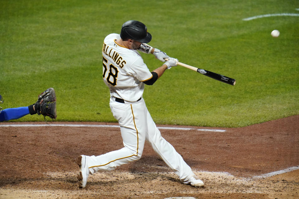 Pittsburgh Pirates' Jacob Stallings hits a walk-off solo home run off Chicago Cubs relief pitcher Andrew Chafin during the bottom of the ninth inning of a baseball game in Pittsburgh, Tuesday, Sept. 22, 2020. The Pirates won 3-2. (AP Photo/Gene J. Puskar)
