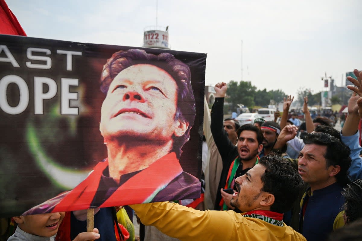 Supporters of former Pakistani prime minister Imran Khan take part in a protest a day after the attack  (AFP via Getty Images)