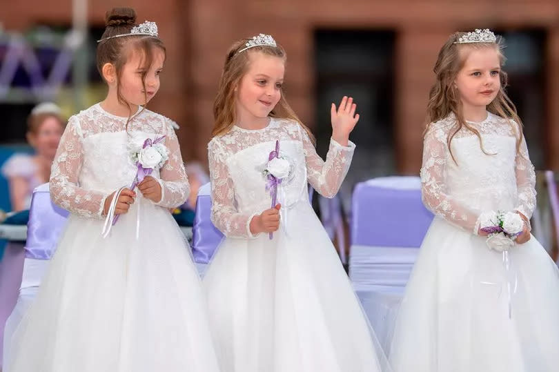 Flower girls Harper Thomson, Emilia Evans and Lillie Riddick