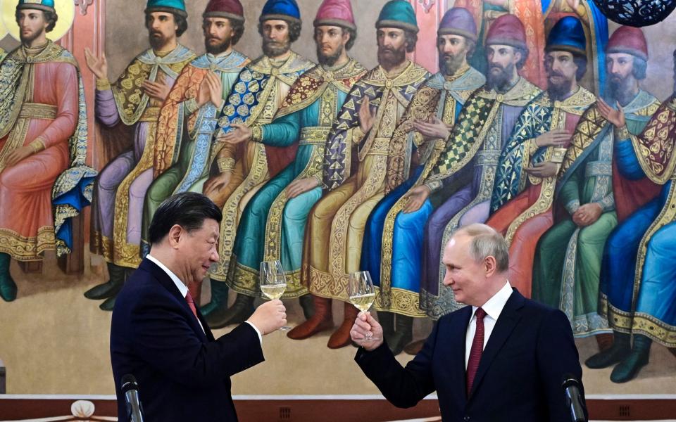 Putin and Xi at a lavish banquest put on for the visiting Chinese leader - Pavel Byrkin/Pool Sputnik Kremlin