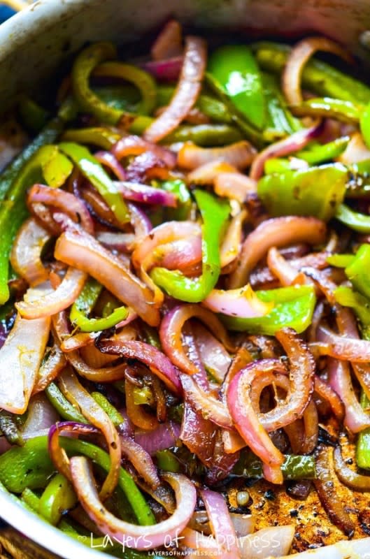 <p>Layers of Happiness</p><p><strong>Healthy caramelized peppers and onions with an amazing smoky char flavor – just like the pepper and onions you get on your favorite Chipotle Mexican Grill order.</strong></p><p><strong>Get the recipe: </strong><a href="https://www.layersofhappiness.com/copycat-chipotle-grilled-peppers-and-onions/" rel="nofollow noopener" target="_blank" data-ylk="slk:Copycat Chipotle Grilled Peppers and Onions;elm:context_link;itc:0;sec:content-canvas" class="link ">Copycat Chipotle Grilled Peppers and Onions</a></p>