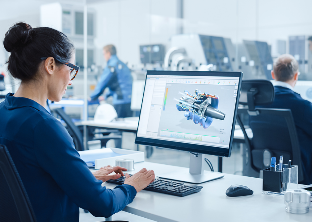 Mechanical engineer working on a computer.