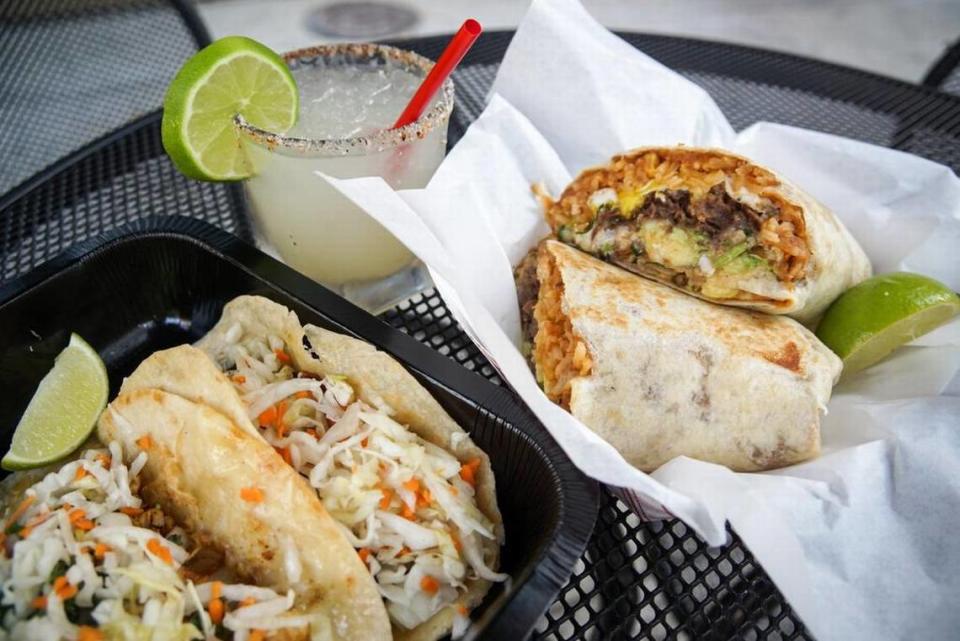 Burritos, taco and a margarita from Salsa Limon, which plans to open its “Distrito” location in August in west Fort Worth