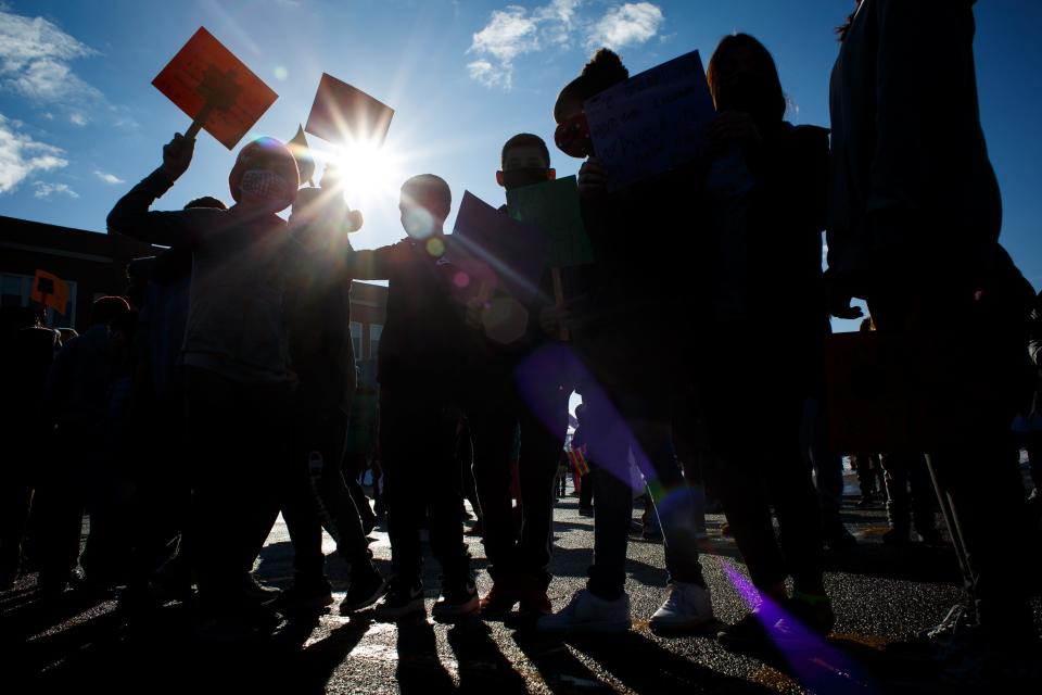 Students from Hubbell Elementary school mark around the block during their annual "Dream Walk" in honor of Black History Month on Thursday, Feb. 25, 2021, in Des Moines, IA. 